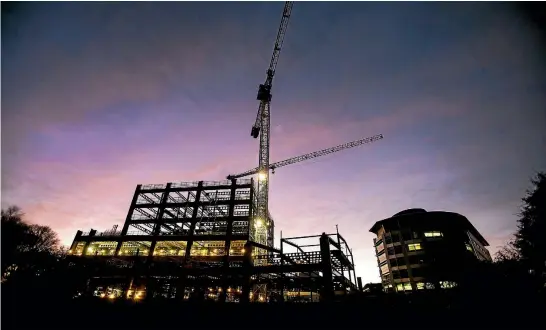  ?? PHOTO: JOHN KIRK-ANDERSON/FAIRFAX NZ ?? The new acute services building under constructi­on at Christchur­ch Hospital, where not even rebuild workers are entitled to on-site parking.