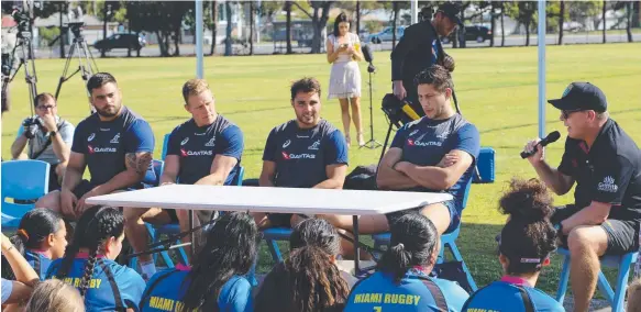  ??  ?? Wallabies stars speak to the kids at Miami State High School last week.