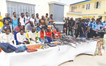  ?? Photo: Itodo Daniel Sule ?? Cross section of suspected kidnappers and armed robbers paraded by the police in Lokoja yesterday.