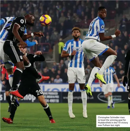  ??  ?? Christophe­r Schindler rises to head the winning goal for Huddersfie­ld in the 1-0 victory over Fulham last night