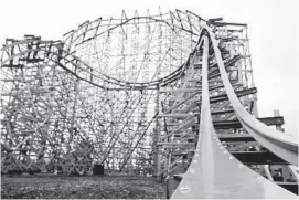  ?? PHOTOS BY STACEYWEST­COTT/CHICAGO TRIBUNE ?? Steel coated, bendable tracks are one of the key elements that will allow Goliath to become the fastest and steepest wooden coaster in the world.