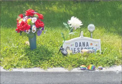  ?? DAVID JALA/CAPE BRETON POST ?? A small shrine paying tribute to Dana Jessome still sits along the curb near the Oxford Avenue location where the 28-year-old was struck by a vehicle. Jessome later died from injuries sustained in the July 14 incident.