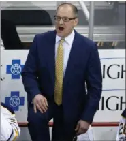 ?? GENE J. PUSKAR — THE ASSOCIATED PRESS FILE ?? In this file photo, Buffalo Sabres head coach Dan Bylsma expresses himself to an official during the third period of an NHL hockey game against the Pittsburgh Penguins, in Pittsburgh. The Buffalo Sabres have fired general manager Tim Murray and coach...