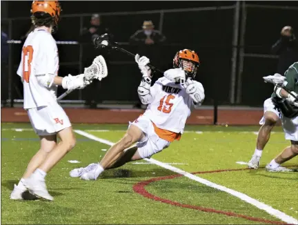  ?? AUSTIN HERTZOG — MEDIANEWS GROUP ?? Perkiomen Valley’s Jack Scaliti shoots while falling and scores the game-winning overtime goal in a 7-6win over Methacton Friday.