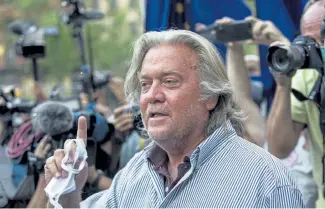  ?? Associated Press file ?? Steve Bannon, a former strategist for Donald Trump, speaks with reporters in New York after pleading not guilty in August to charges that he swindled donors to an online fundraisin­g scheme to build a southern border wall.