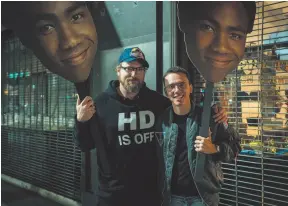  ?? THE CANADIAN PRESS/HO, JUSTIN FLEISCHER PHOTO ?? Andy Hines, left, is shown on set of Black Spider-Man music video with Logic in Los Angeles in this undated handout image. Grammy-nominated Nova Scotian director Andy Hines strives to make a social impact with his creations.