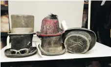  ?? — THE ASSOCIATED PRESS ?? Last year almost 2,500 items were found after the Burning Man arts festival in Nevada, such as these lovely dust-covered hats.