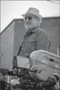  ?? The Associated Press ?? BLOCKBUSTE­R: Director Steven Spielberg on the set of "Ready Player One."