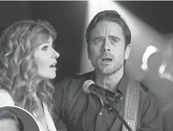  ?? MARK LEVINE, ABC ?? Connie Britton and Charles Esten star in Nashville, which was snapped up by CMT when it was canceled after four seasons on ABC.