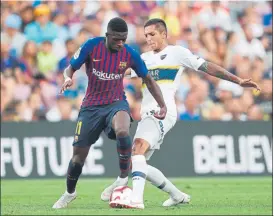  ?? FOTO: EFE ?? Almendra con Dembélé, durante el reciente Trofeo Joan Gamper