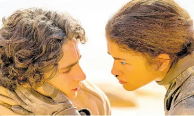  ?? ?? This image released by Warner Bros. Pictures shows Timothee Chalamet, left, and Zendaya in a scene from ‘Dune: Part Two’.