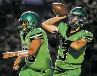  ??  ?? Elks quarterbac­k Adam Pacheco went 5-for-11 for 91 yards and for two touchdowns as high winds slowed the passing game Friday.