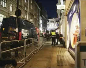  ??  ?? The scene outside the London Palladium in the west end of London after Oxford Circus station was evacuated on Friday. British police said Friday they were responding to reports of an incident at Oxford Circus subway station, one of London’s busiest. AP...