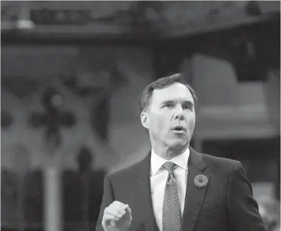  ??  ?? Minister of Finance Bill Morneau responds during question period in the House of Commons on Nov. 2.