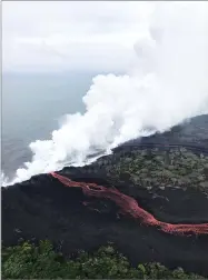  ?? AP PHOTO VIA U.S. GEOLOGICAL SURVEY ?? This image provided by the U.S. Geological Survey shows lava as it continues to enter the sea at two locations near Pahoa, Hawaii, Monday, May 21.