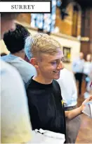  ??  ?? Right, William Medlock opens his results with friends Luke Denny and Ben Haynes at Caterham School.
SURREY