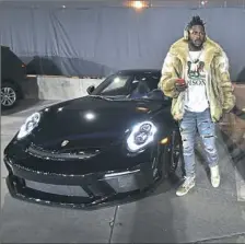  ?? Peter Diana/Post-Gazette ?? Steelers wide receiver Antonio Brown arrives in his Porsche on Thursday at Heinz Field.