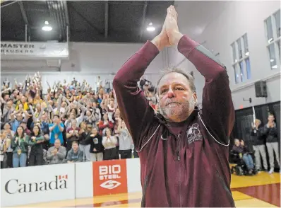  ?? BARRY GRAY PHOTOS THE HAMILTON SPECTATOR ?? McMaster head coach Dave Preston salutes the crowd following his final game at the helm of the Marauders.