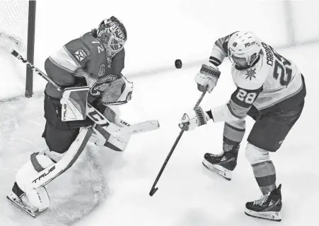  ?? LYNNE SLADKY/AP ?? Panthers goaltender Sergei Bobrovsky (72) defends the goal against Golden Knights left wing William Carrier (28) during the third period of Game 3 of the Stanley Cup Final on Thursday in Sunrise, Fla.