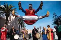  ??  ?? A Gnawa traditiona­l group performs in the
city of Essaouira.