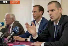  ??  ?? Former chairmen of the chambers of the independen­t Fifa Ethics Committee, Hans-Joachim Eckert (left) and Cornel Borbely (right) at a press conference in Manama. —