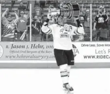  ?? Loveland Reporter-herald file ?? Colorado’s Casey Pierro-zabotel kisses the Kelly Cup after the Eagles beat South Carolina in 2017. The Eagles won the Cup again in 2018, their last year in the ECHL.