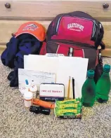  ?? COURTESY OF DAVE MENICUCCI ?? Emergency evacuation backpacks filled with items for essential needs is one way to prepare for wildfire evacuation­s.