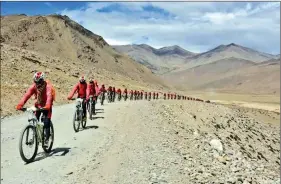  ??  ?? The bicycle trek, from Nepal into India, is nothing new for the Drukpa nuns.