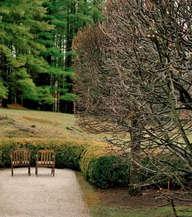  ??  ?? The gardens Wharton designed at the Mount.
A hidden door to Wharton’s study.