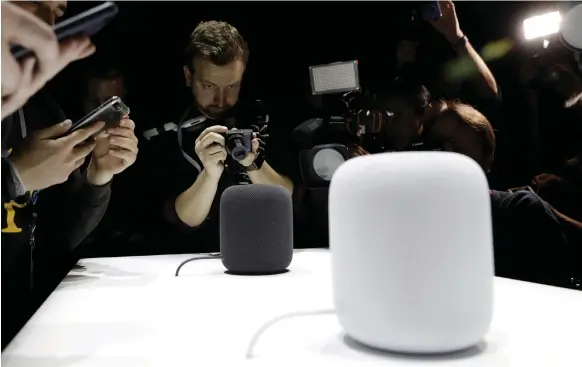  ??  ?? Apple’s HomePod speaker is joining the fray among a selection of internet-connected devices that carry out tasks via verbal instructio­ns