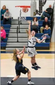  ?? SUBMITTED PHOTO - DENNIS KRUMANOCKE­R ?? Kutztown’s Rachael McCoach scores over an Upper Perkiomen player during a game last week.