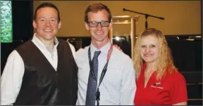  ?? The Sentinel-Record/Tanner Newton ?? MENTAL HEALTH: Anthony Thornton, center, was the keynote speaker at the AEMTA 2019 EMS Symposium & Trade Show. He survived a traumatic injury that left him suffering depression. Kevin Yoder, left, and Carrie Reynolds worked the scene and were also affected by the incident. All three spoke about the importance of getting help if you need it.