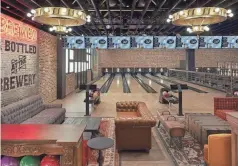  ?? PHOTOS BY MGM SPRINGFIEL­D ?? The bowling alley inside TAP Sports Bar features 10 lanes and food and beverage offerings.