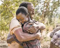  ?? ILZE KITSCHOFF/NETFLIX ?? Chewitel Ejiofor, left, and Maxwell Simba appear in “The Boy Who Harnessed the Wind.”