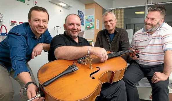  ?? PHOTO: ROSS GIBLIN/STUFF ?? Slava Fainitski, second from left, with friends, from left, Alexander Gunchenko, Brenton Veitch and Emilio Bertrand.