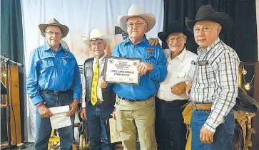  ??  ?? Lang Lang’s Alan Light, left, and Stephen Kent, president of the Lang Lang Rodeo organising committee, third from left, with the Australian Profession­al Rodeo Associatio­n induction members, Jack Gill, Bonny Young and Darryl Joe Kong.