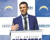  ?? KELVIN KUO AP ?? Chargers General Manager Tom Telesco has rapport with President of Football Operations John Spanos.