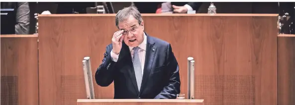  ?? FOTO: FABIAN STRAUCH/DPA ?? Ministerpr­äsident Armin Laschet informiert den Landtag über die Ergebnisse der Länderbera­tungen mit der Bundeskanz­lerin.
