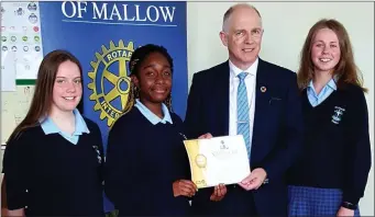  ??  ?? The team from St Mary’s Secondary School, Mallow, receiving their certificat­e of participat­ion from Minister of State David Stanton TD.