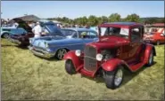  ?? CARL HESS - DIGITAL FIRST MEDIA ?? Sitting tall is Allen Turner’s 1931 Model A Ford street rod from Fleetwood. Next in line is Patricia Bailey’s 1957 Chevy Bel-Air from Leesport.