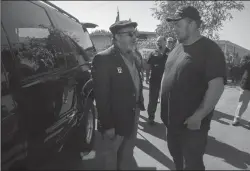  ?? CLIFFORD OTO/THE RECORD ?? Army veteran Harvey Stenson, right, talks with fellow veteran Raphael Pazo of Lodi, who donated his 1999 Chevrolet Suburban to Stenson through the Vehicles 4 Veterans program.