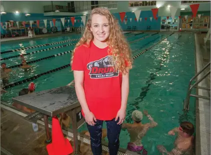  ?? MARK BUFFALO/THREE RIVERS EDITION ?? Cabot High School swimmer Melanie Abbott, standing next to the pool at the Veterans Park Community Center in Cabot, recently signed with Drury University in Springfiel­d, Mo., to participat­e in the triathlon, which consists of swimming, cycling and...