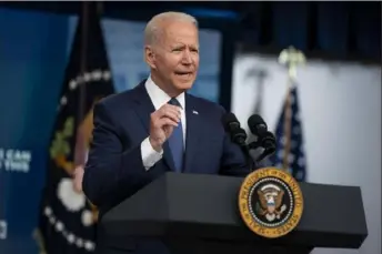  ?? Evan Vucci/Associated Press ?? President Joe Biden speaks about the COVID-19 vaccinatio­n program during an event July 6 in the South Court Auditorium on the White House campus in Washington. Mr. Biden is expected to announce all federal workers get vaccinated or get tested for COVID-19 repeatedly.