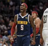  ?? Aaron Ontiveroz / The Denver Post ?? The Nuggets’ Will Barton celebrates after hitting a 3pointer during the fourth quarter of Wednesday night’s game against the Pacers at Ball Arena in Denver.