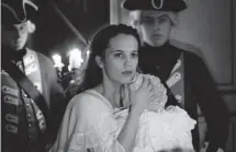  ?? JIRI HANZL ?? Queen Caroline (Alicia Vikander) enjoyed a long-term romance with Dr. Johann Struensee (Mads Mikkelsen) in the film A Royal Affair.