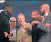  ??  ?? BREAK: Frank Warren separates Wilder and Fury