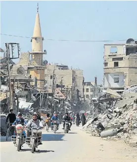  ?? AP ?? Destrucció­n. La ciudad siria de Duma tras la derrota de los rebeldes.