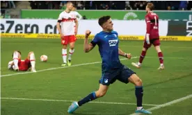  ?? Photograph: Ronald Wittek/EPA ?? Hoffenheim's Christoph Baumgartne­r celebrates after scoring the late winning goal to break Stuttgart hearts.