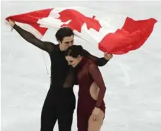  ?? STEVE RUSSELL/TORONTO STAR ?? Canada’s Scott Moir and Tessa Virtue added to their already considerab­le star power with their gold-medal-winning performanc­e in ice dance.