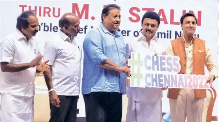 ?? S. R. RAGHUNATHA­N ?? Countdown begins:
The Tamil Nadu Chief Minister M. K. Stalin unveils the hashtag for the Chess Olympiad. From left are V. Meyyanatha­n, Minister for Youth Welfare and Sports Developmen­t, M. Subramania­n, Minister for Health and Family Welfare, Bharat Singh Chauhan, secretary, All India Chess Federation and Tournament Director, 44th Chess Olympiad, and Sanjay Kapoor, President, All India Chess Federation.